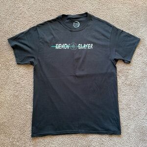 Black Demon Slayer Official Merch anime graphic sword tee with green accents